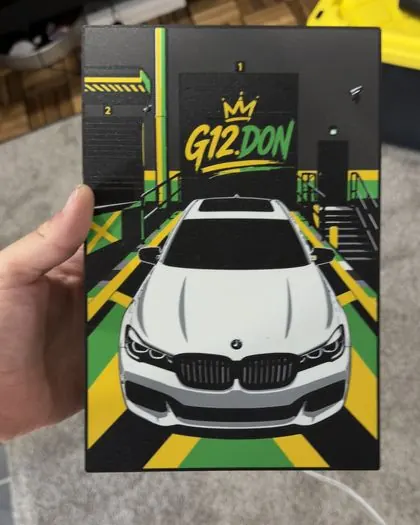 The 3D printed light box panel held in a hand