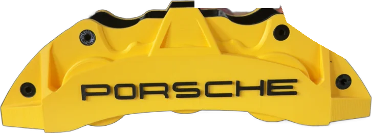 A 3D printed yellow Porsche brake caliper pen holder